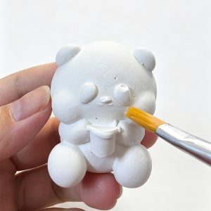 09 hand paint blank plaster statue with paintbrush