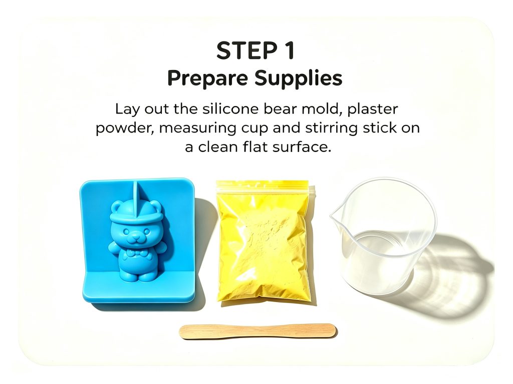 Step 1 Prepare Supplies: Lay out silicone bear mold, plaster powder, measuring cup and stirring stick on clean flat table